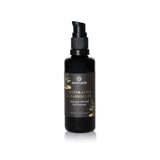 Annmarie's Restorative Cleansing Oil in a black bottle features manuka-infused ingredients for gentle face cleansing.
