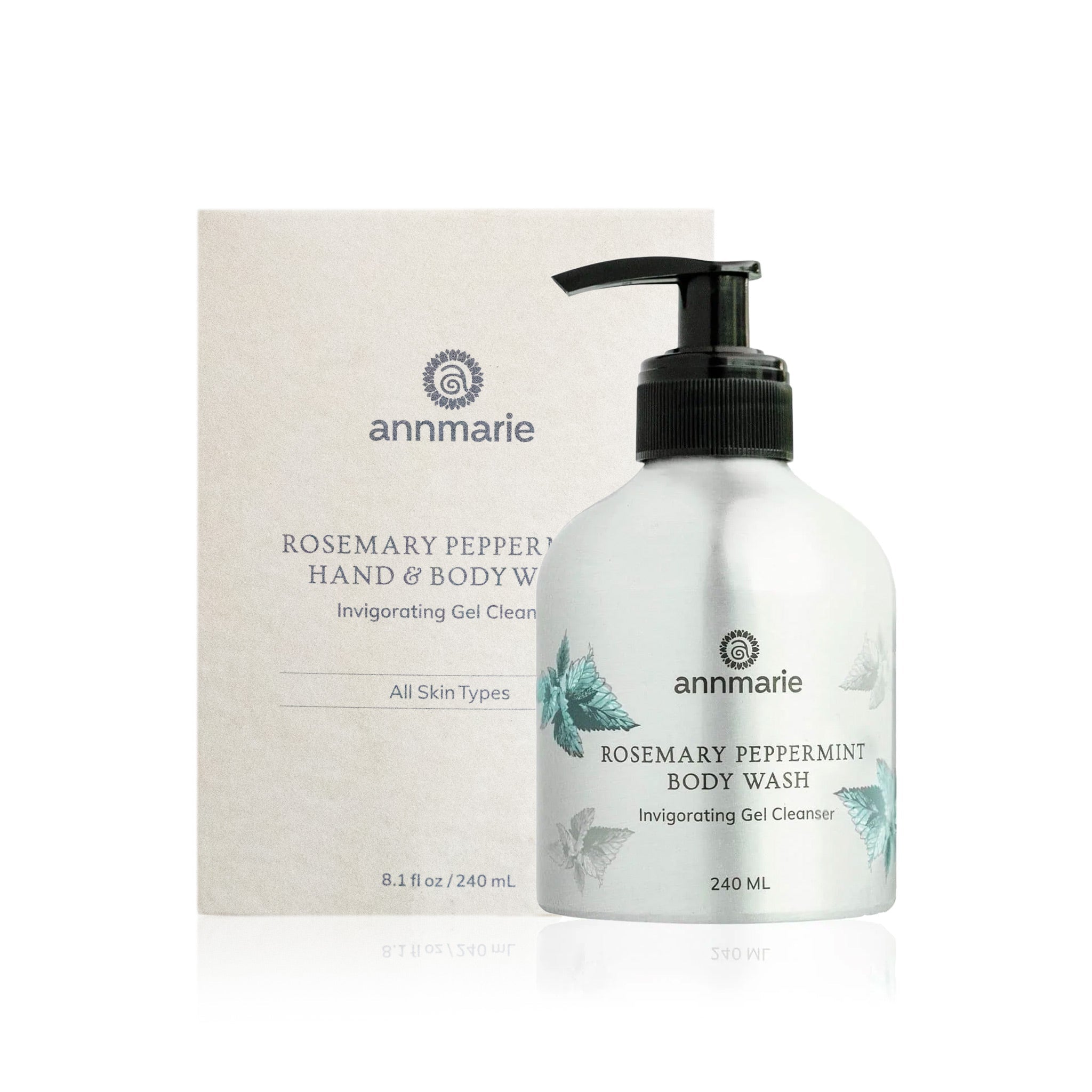 Annmarie's rosemary peppermint body wash sits next to its packaging, showcasing the natural skincare brand.
