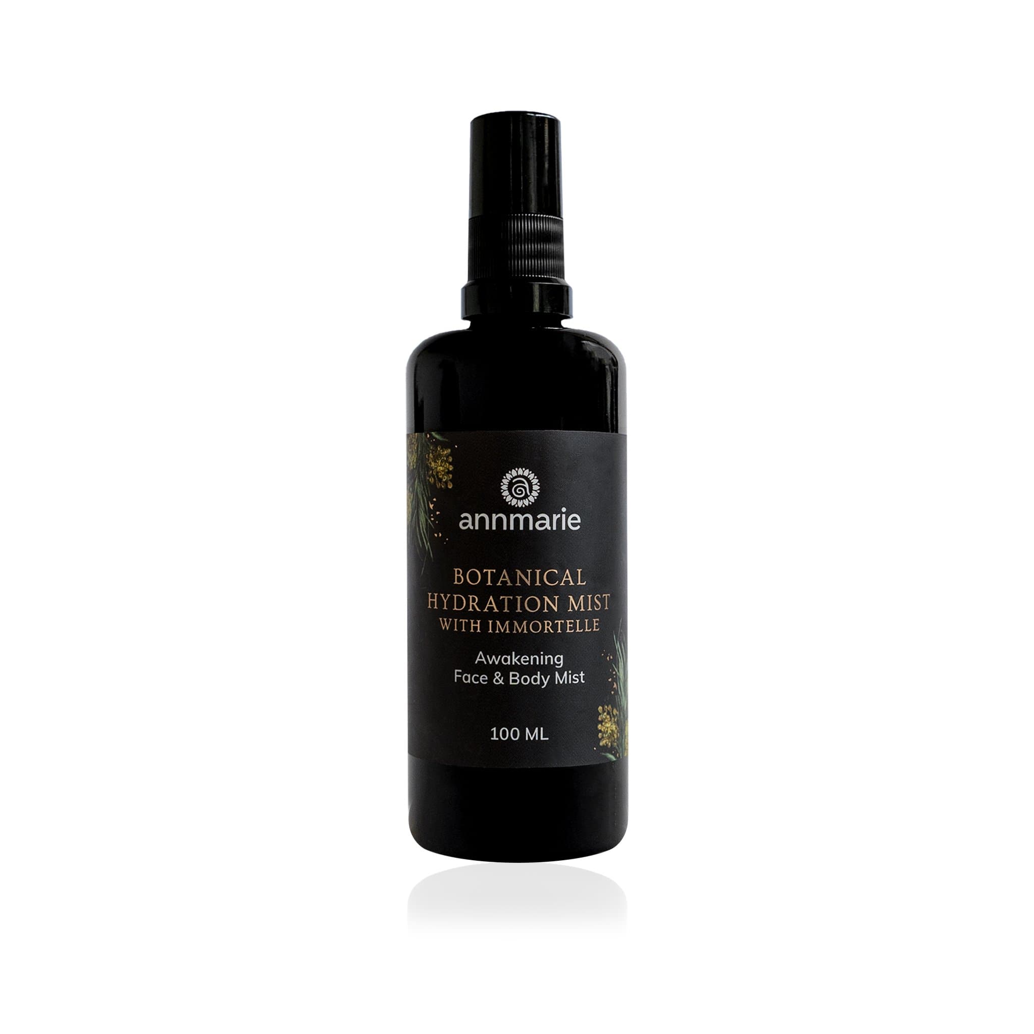 Annmarie's black bottle displays its Botanical Hydration Mist with Immortelle, an Awakening Face & Body Mist in 100 ml.
