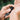 A person pumps Annmarie Wild Fruit Serum onto their hand.
