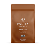 Purity Coffee displays its Protect light-medium roast, USDA Organic, and Bird Friendly ground coffee in a brown bag.
