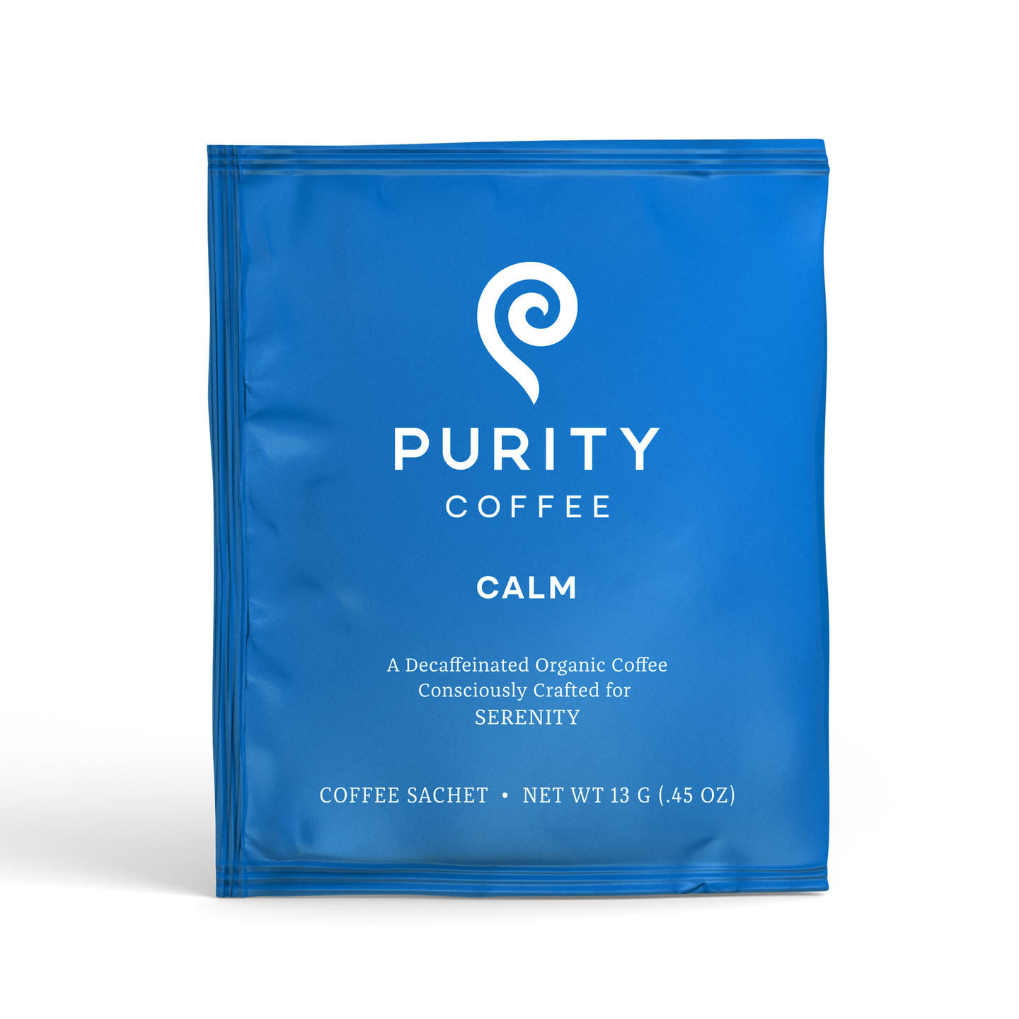 Purity Coffee presents its Calm blend in a blue sachet of decaffeinated organic coffee crafted for serenity.
