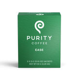 View a package of Purity Coffee Ease, featuring a green box with white text and a spiral logo.
