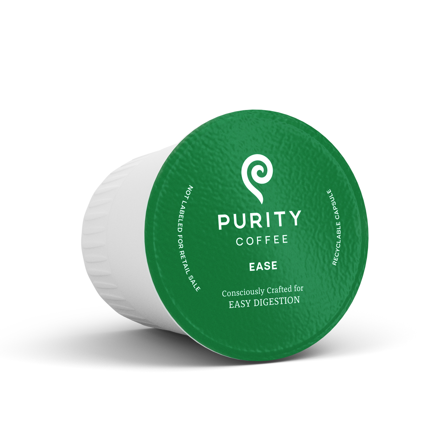 Purity Coffee showcases their Ease blend in a single-serve, recyclable capsule designed for easy digestion.
