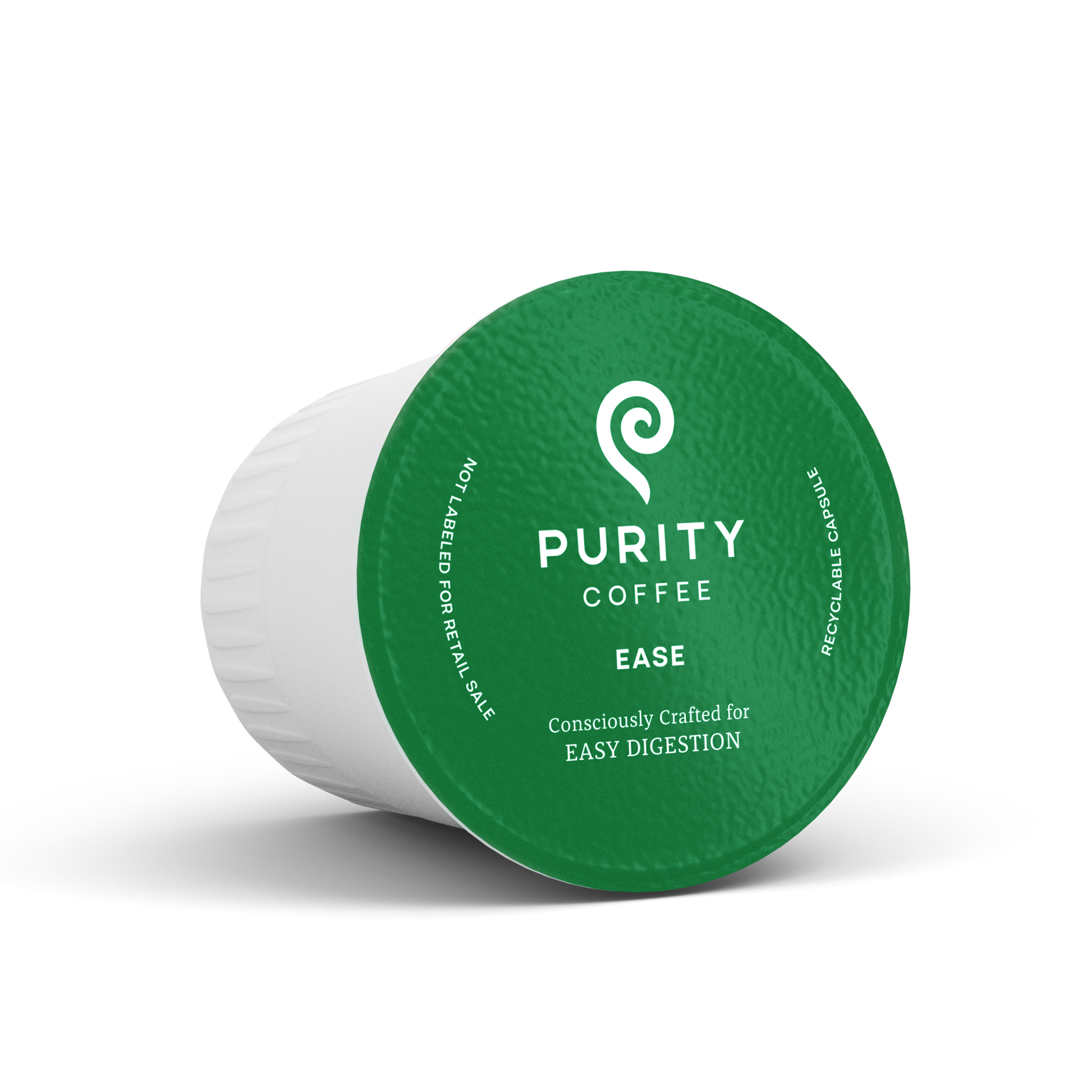 Purity Coffee showcases their Ease blend in a single-serve, recyclable capsule designed for easy digestion.
