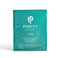 Purity Coffee's teal sachet contains medium-roasted organic coffee for overall health.
