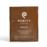 Purity Coffee presents its "Protect" blend, a medium-roasted organic coffee consciously crafted for liver vitality, showcased in a brown coffee sachet.
