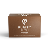 Purity Coffee displays a brown box of their 'Protect' coffee pods, highlighting their net weight and cup count.
