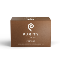 Purity Coffee displays a brown box of their 'Protect' coffee pods, highlighting their net weight and cup count.
