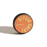 URB Apothecary's Repair Salve in a small, round tin promises natural skincare healing.
