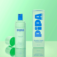PIPA skincare bottle and packaging on a green background