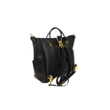 A black leather convertible tote bag shows off its adjustable shoulder straps and gold hardware.
