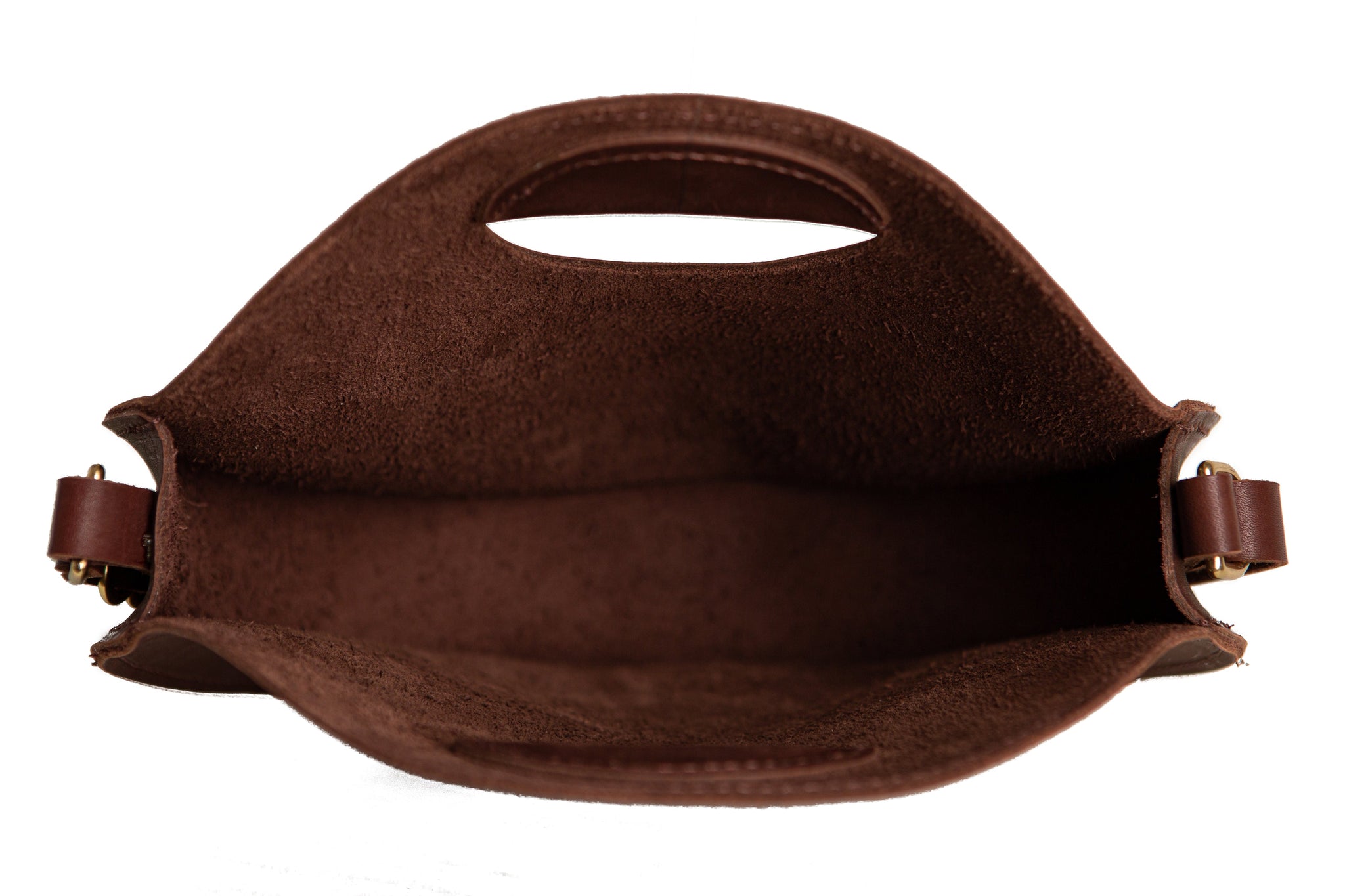 A brown leather tote bag displays its open interior.
