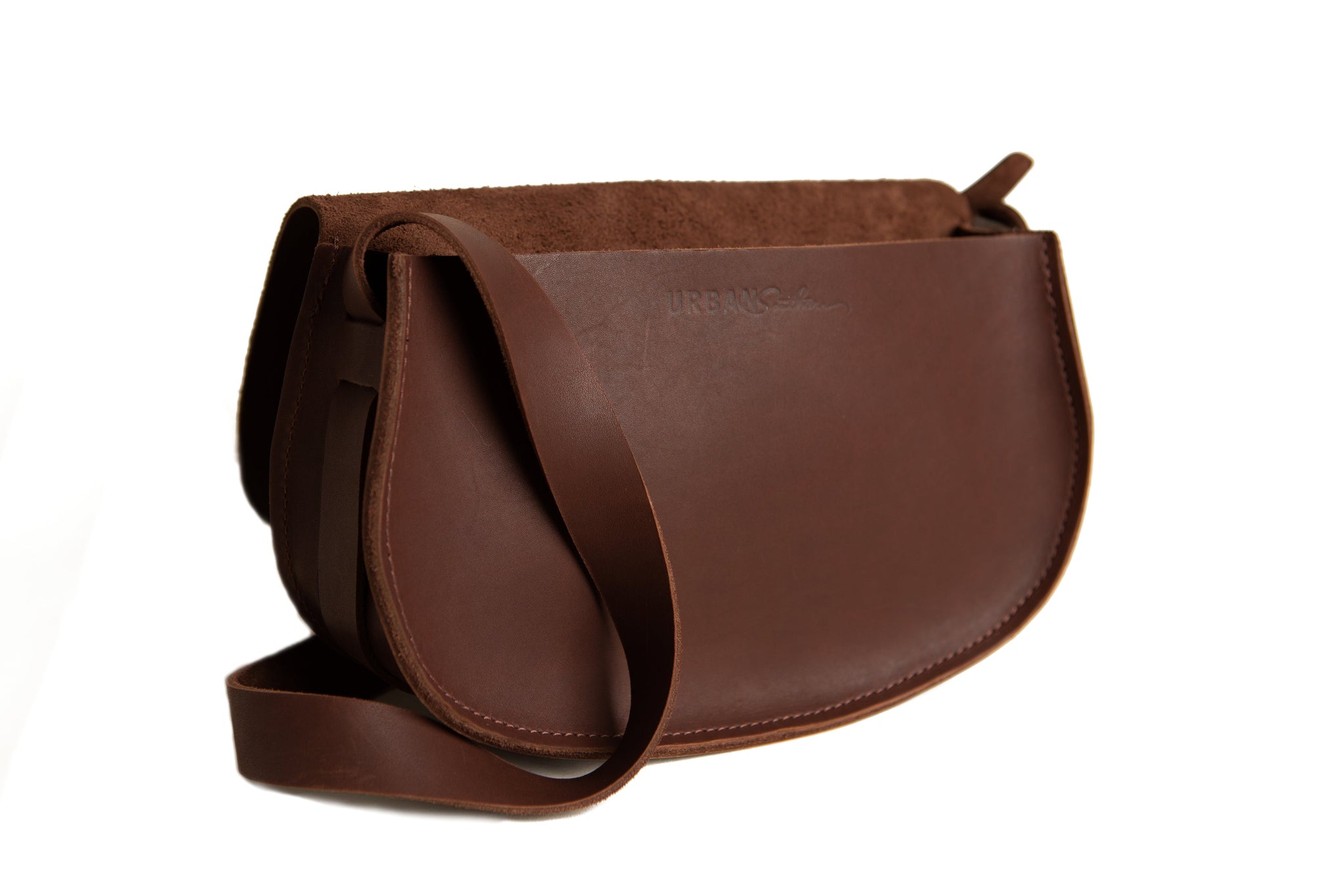 Showcases a stylish brown leather crossbody bag from Urban Sophistication against a clean white background.
