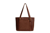 Showcases a stylish brown leather tote bag featuring gold buckle details and a suede panel on a white background.
