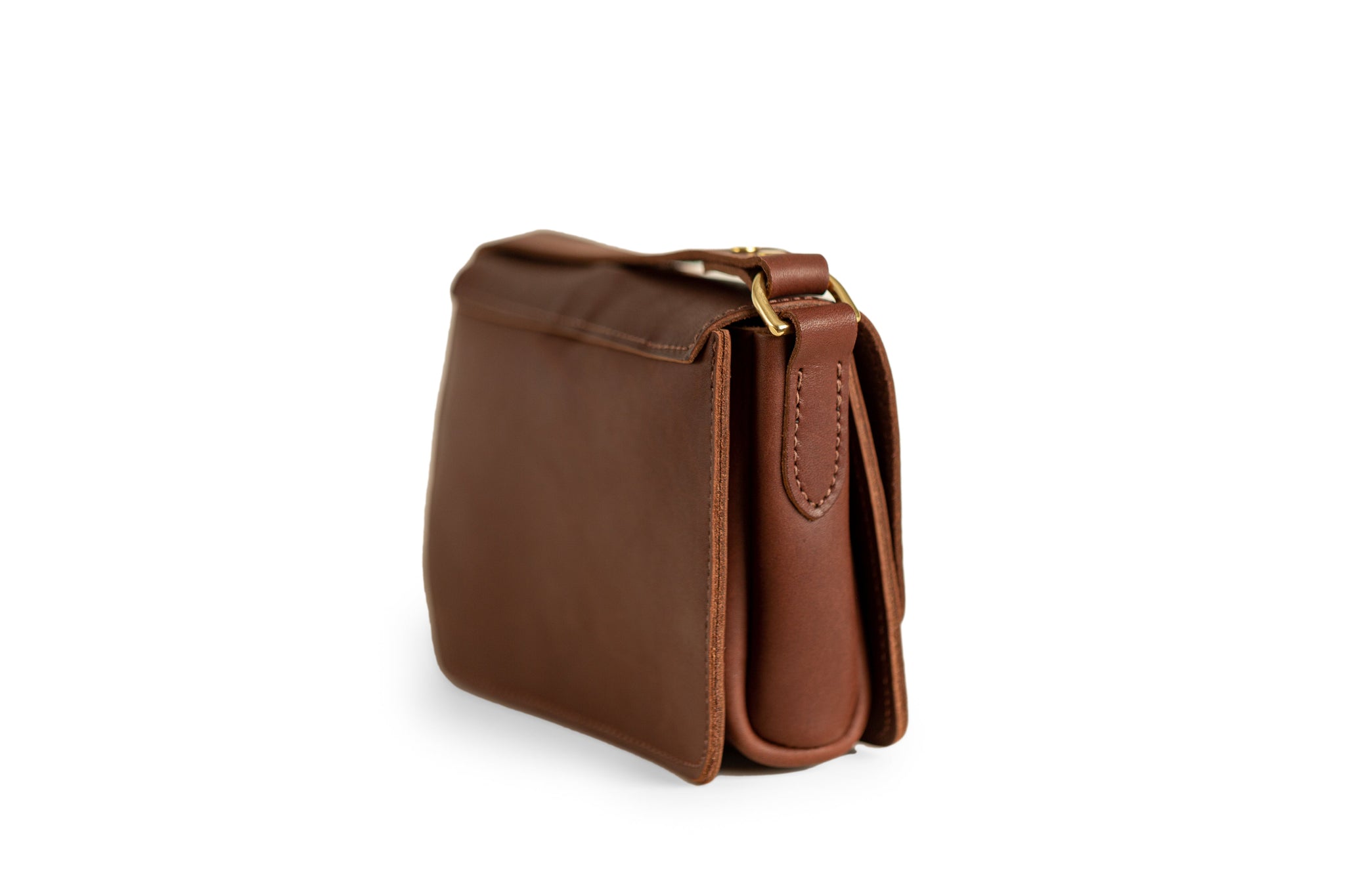 A luxurious brown leather satchel purse displays fine stitching and gold hardware details.

