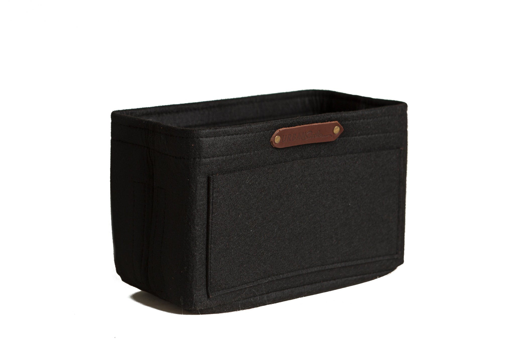 Showcases a black felt handbag organizer insert with a brown leather brand label.
