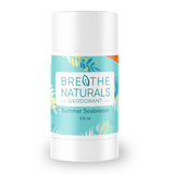 Breathe Naturals deodorant stick displays its Summer Seabreeze scent in a white container with a tropical leaf design.
