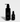 Jack Henry presents their Super Face Cleanser and Super Face Serum skincare products in sleek, black bottles.
