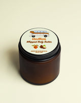 VanMan's whipped body butter, featuring grassfed beef tallow, shea butter, olive oil, and honey, shows a VW bus on its label.
