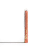 Urb. Apothecary presents lavender bath salts in a clear tube, advertising a relaxing spa experience.
