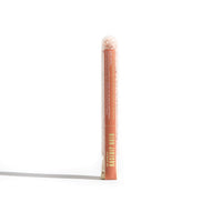 Showcase Urb. Apothecary Rosehip Bath salts in a clear tube, highlighting its blend of Himalayan pink salt and essential oils.
