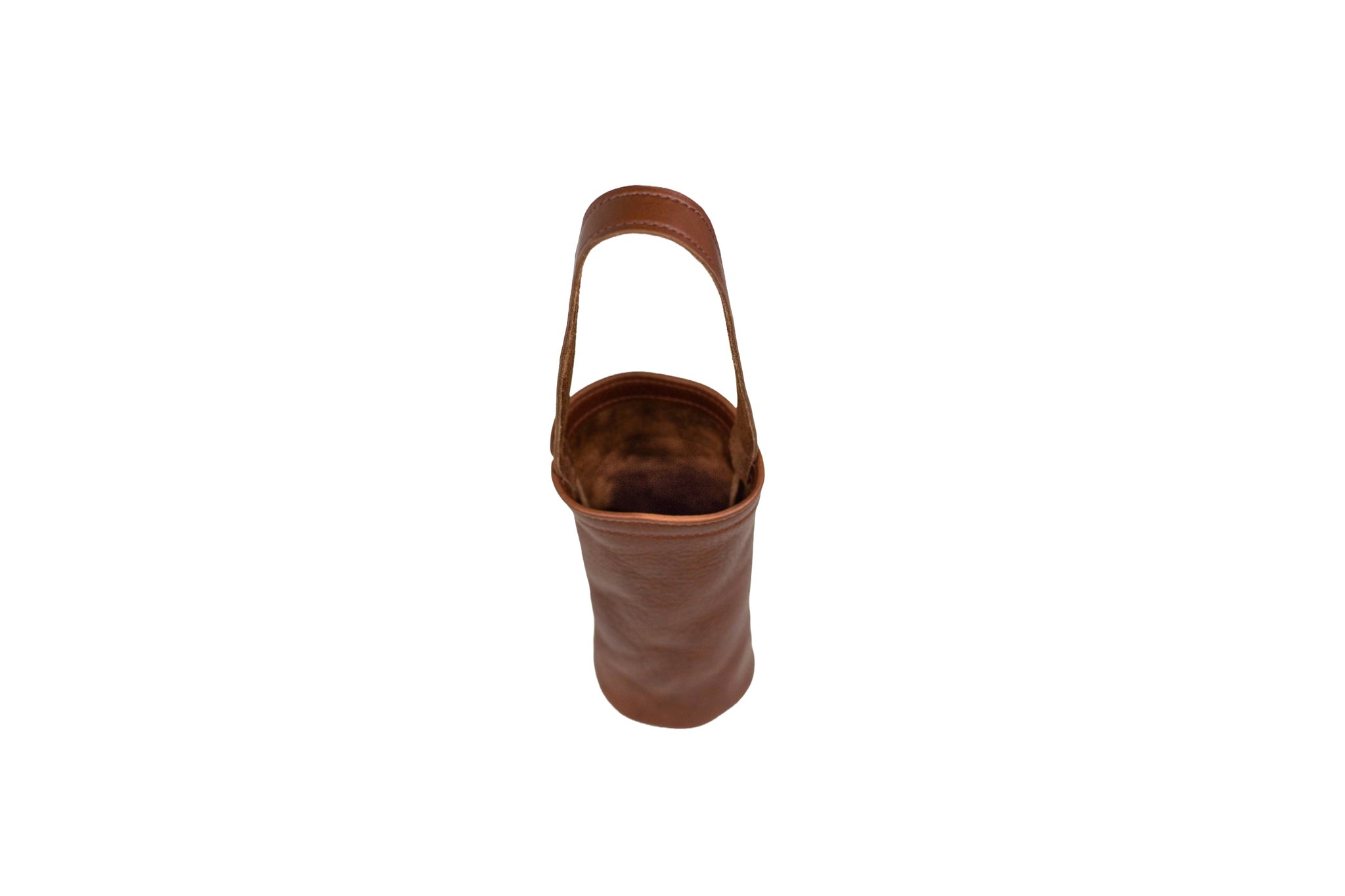 A brown leather wine tote bag with a handle sits upright on a white background.
